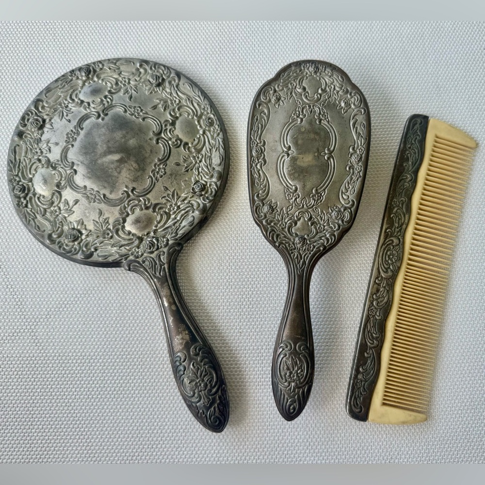 Antique vintage ornate silver plated hand mirror, brush, comb vanity set